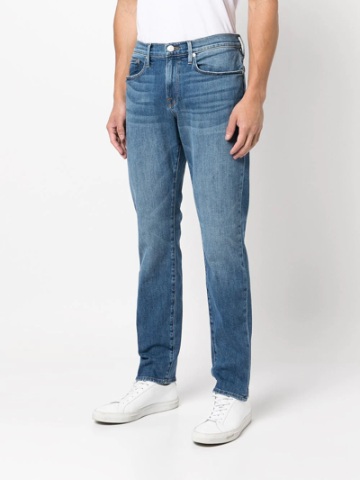 Shop Frame Straight-leg Mid-rise Jeans In Blue