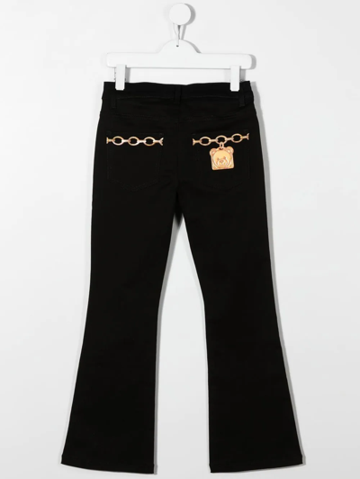 Shop Moschino Chain-link Print Detail Trousers In Black