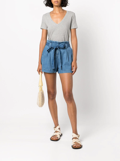 Shop L Agence Hillary Belted Denim Shorts In Blue