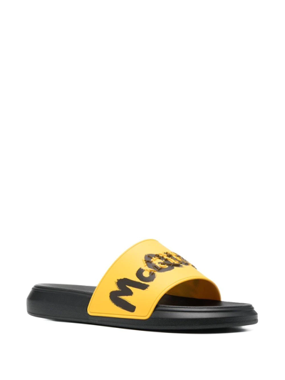 Shop Alexander Mcqueen Graffiti-logo Slip-on Slides In Yellow