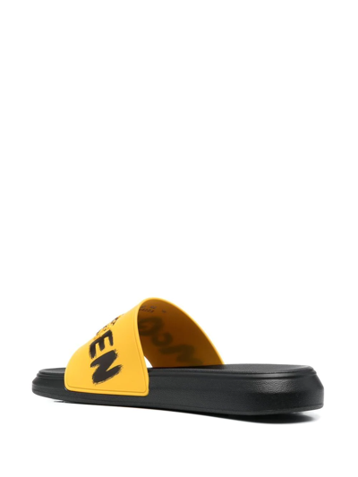 Shop Alexander Mcqueen Graffiti-logo Slip-on Slides In Yellow