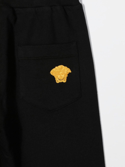 Shop Versace Medusa Embroidery Track Pants In Black