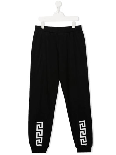 Shop Versace Teen Greca Print Track Pants In Black