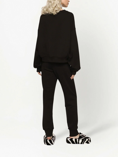 Shop Dolce & Gabbana Logo-embossed Track Pants In Black