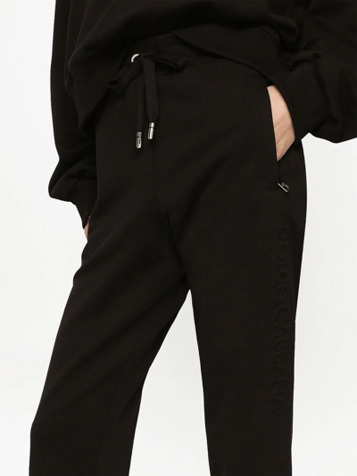 Shop Dolce & Gabbana Logo-embossed Track Pants In Black