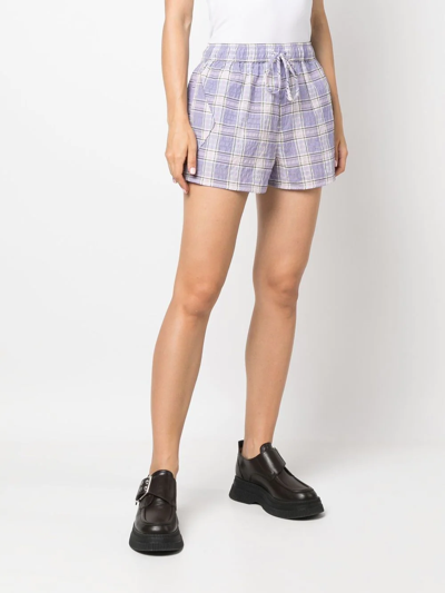 Shop Ganni Check-print Seersucker Shorts In Purple