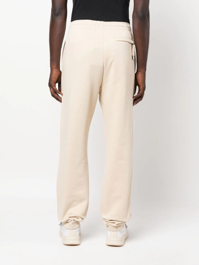 Shop Jacquemus Logo-print Organic Cotton Track Pants In Neutrals