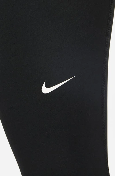 Shop Nike Pro Mid Rise Leggings In Black/ Volt/ White