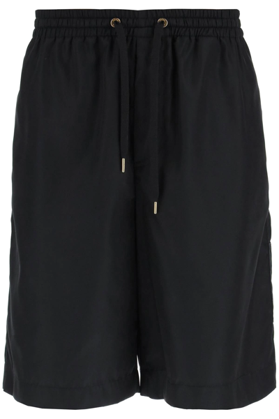Shop Versace La Greca Nylon Bermuda Shorts In Black