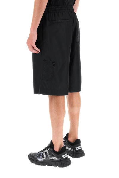 Shop Versace La Greca Nylon Bermuda Shorts In Black