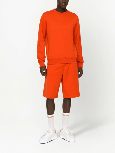 Shop Dolce & Gabbana Embossed-logo Jersey Track Shorts In Orange