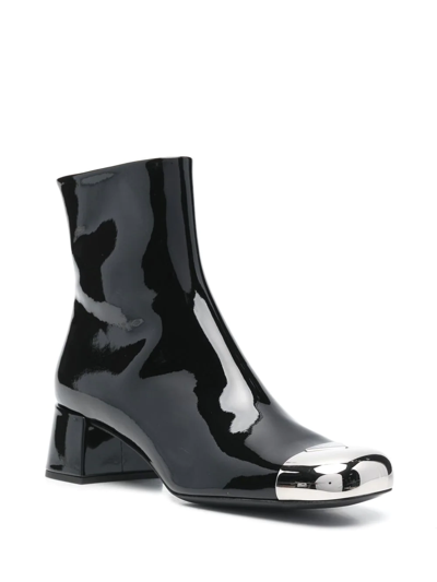 Prada Triangle Logo Plaque Boots In Schwarz