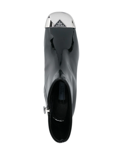 Prada Triangle Logo Plaque Boots In Schwarz