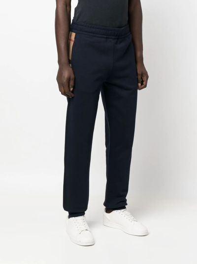 Shop Burberry House Check-panelled Track Pants In Blau