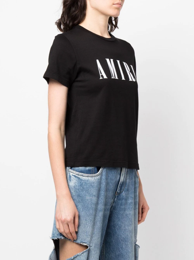 Shop Amiri Logo-print Cotton T-shirt In Black