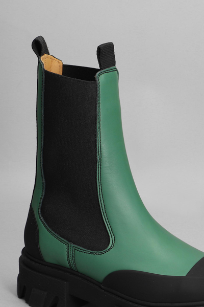 Shop Ganni Cleated Mid Chelsea Combat Boots In Green Leather