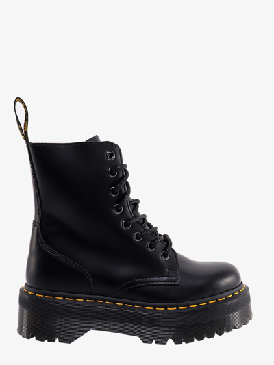 Dr. Martens' Platform Boots With Treaded Sole And Distinctive Accents In Black
