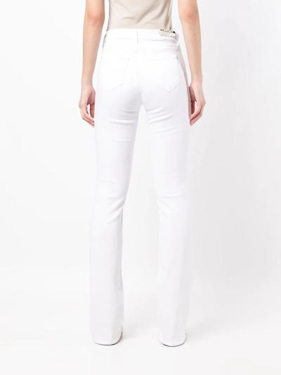 Shop L Agence High-waisted Flared Jeans In White