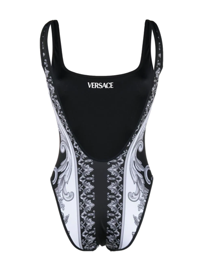 Shop Versace Baroque Pattern-print Swimsuit In Schwarz