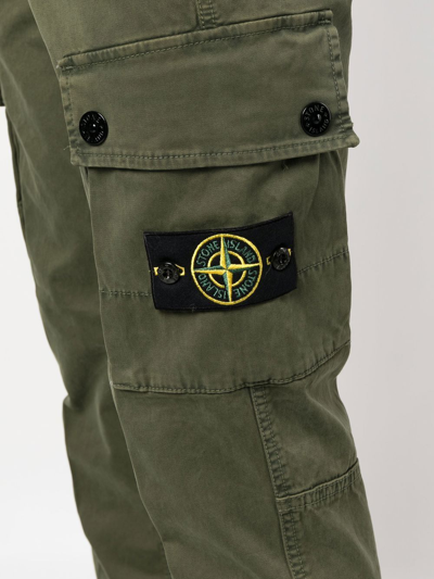 Shop Stone Island Compass-patch Cargo Trousers In Grün