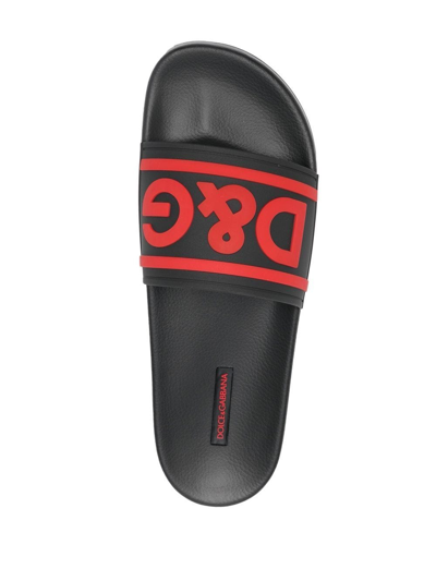 Shop Dolce & Gabbana Embossed-logo Sliders In Schwarz