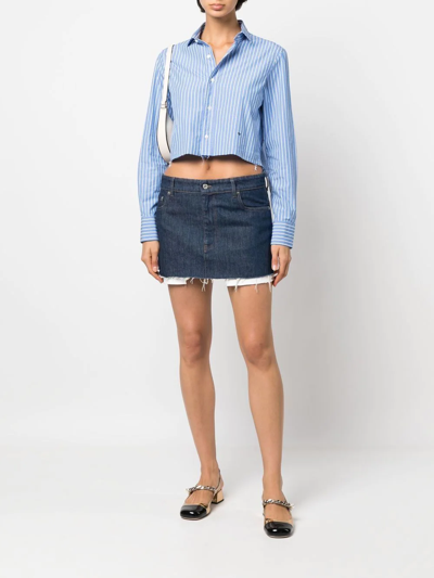 Shop Miu Miu Raw-cut Denim Mini Skirt In Blau