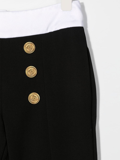 Shop Balmain Button-detail Zipped Flared Trousers In Black