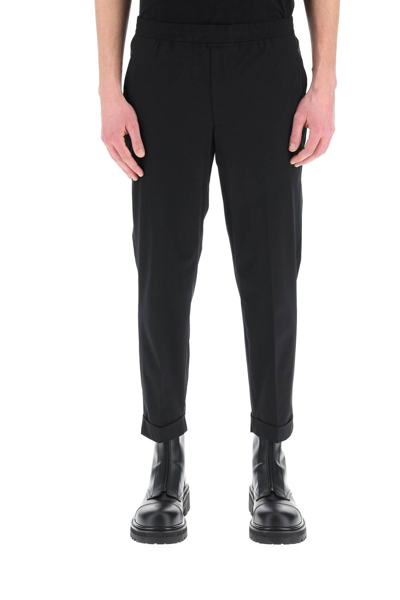 Shop Neil Barrett Travel Slim Trousers In Black (black)