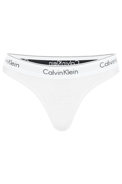 Shop Calvin Klein Branded Border Thongs In White (white)