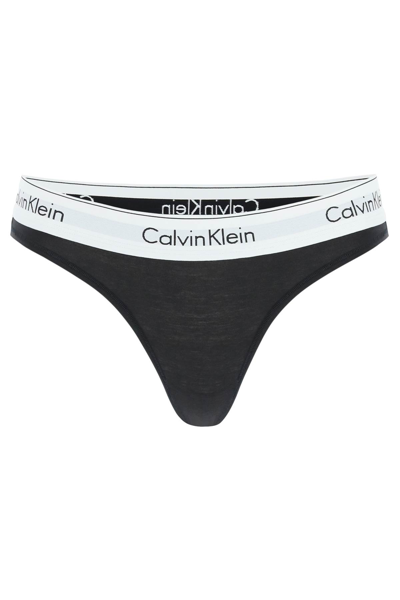 Shop Calvin Klein Branded Border Thongs In Black (black)