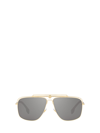 Shop Versace Ve2242 Pale Gold Sunglasses