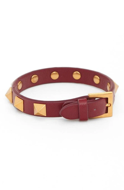 Shop Valentino Rockstud Leather Bracelet In Rubino