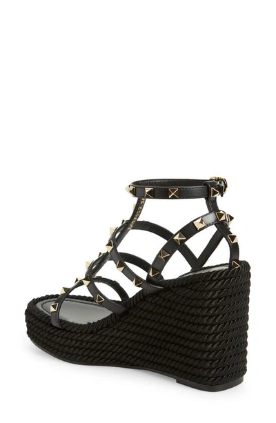 Shop Valentino Garavani Rockstud Torchon Wedge Sandal In Nero