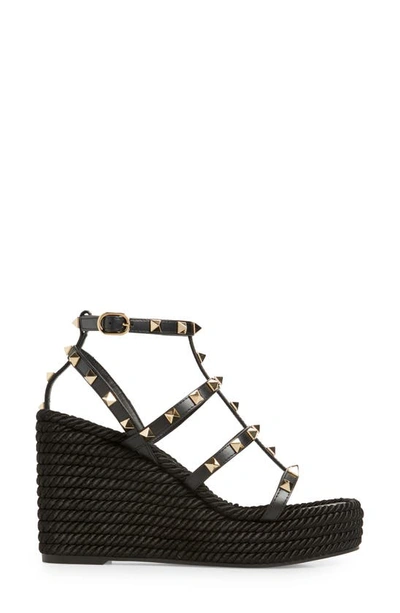 Shop Valentino Garavani Rockstud Torchon Wedge Sandal In Nero