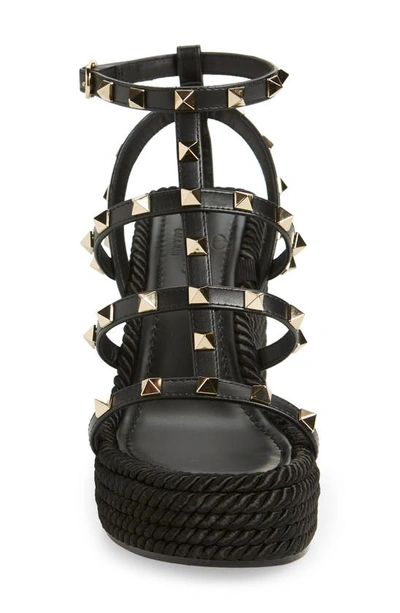 Shop Valentino Rockstud Torchon Wedge Sandal In Nero