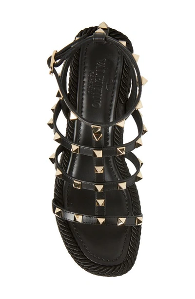 Shop Valentino Rockstud Torchon Wedge Sandal In Nero