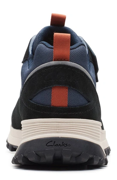 Shop Clarks Atl Trek Walk Waterproof Sneaker In Navy Combi