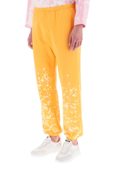 Shop Liberal Youth Ministry Sweatpants With Spray-dye Print In Orange 1 (orange)