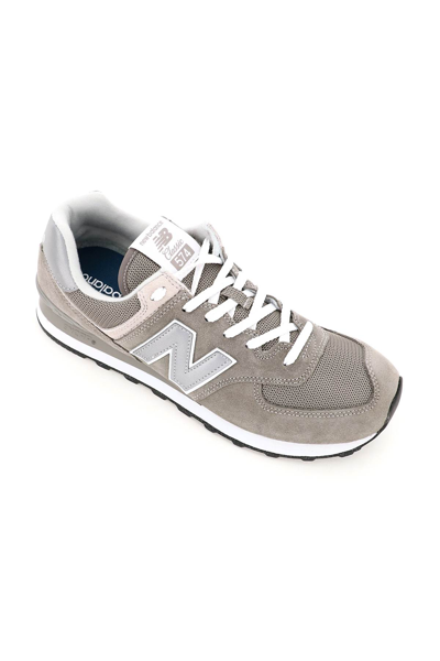 Shop New Balance 574 Sneakers In Grey (grey)