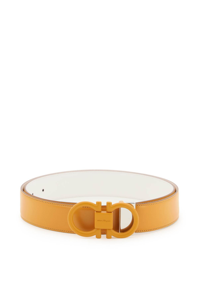 Shop Ferragamo Gancini Buckle Reversible Belt In Olivello B (orange)