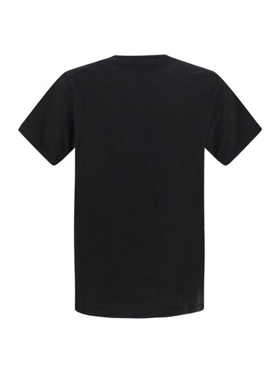 Shop Stone Island Logoed T-shirt In Black