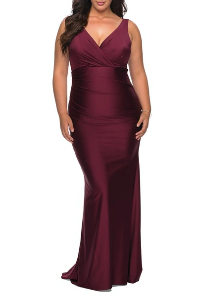 Shop La Femme Simple Jersey Plus Size Gown With Faux Wrap Bodice In Purple