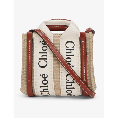 Shop Chloé Woody Small Linen And Leather Cross-body Bag In White - Brown 1