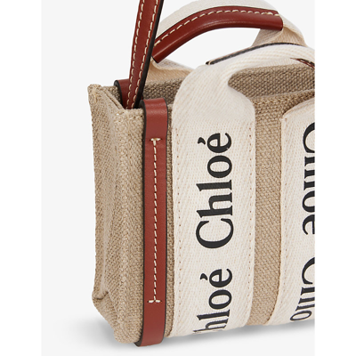 Shop Chloé Woody Small Linen And Leather Cross-body Bag In White - Brown 1
