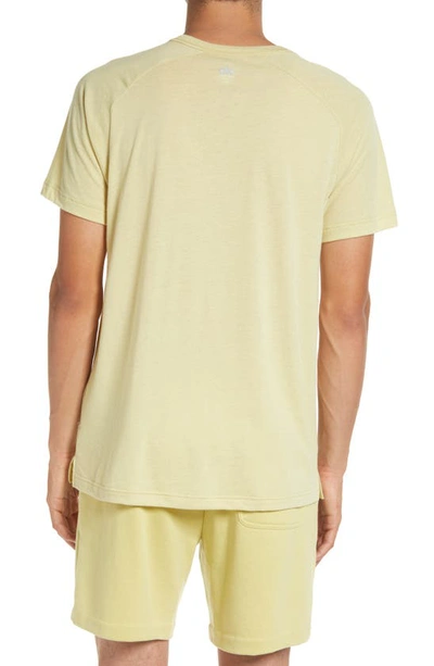 Shop Alo Yoga The Triumph Crewneck T-shirt In Dusty Yellow