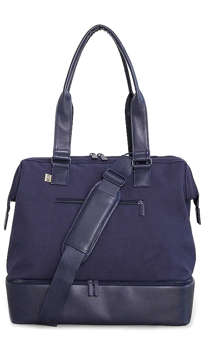 Shop Beis The Convertible Mini Weekend In Navy