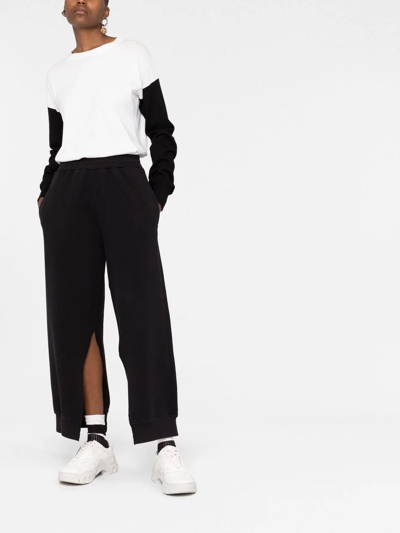 Shop Mm6 Maison Margiela Split-seam Track Pants In Black