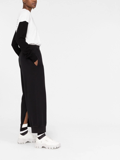 Mm6 Maison Margiela Split-cuff Cotton Track Pants In Black