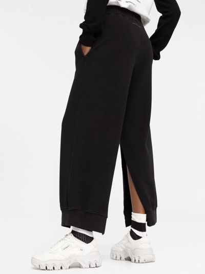 Mm6 Maison Margiela Split-cuff Cotton Track Pants In Black