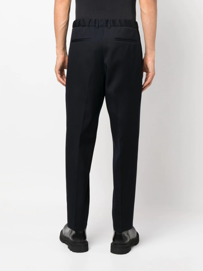 Shop Jil Sander Slim-cut Elasticated-waistband Trousers In Blue